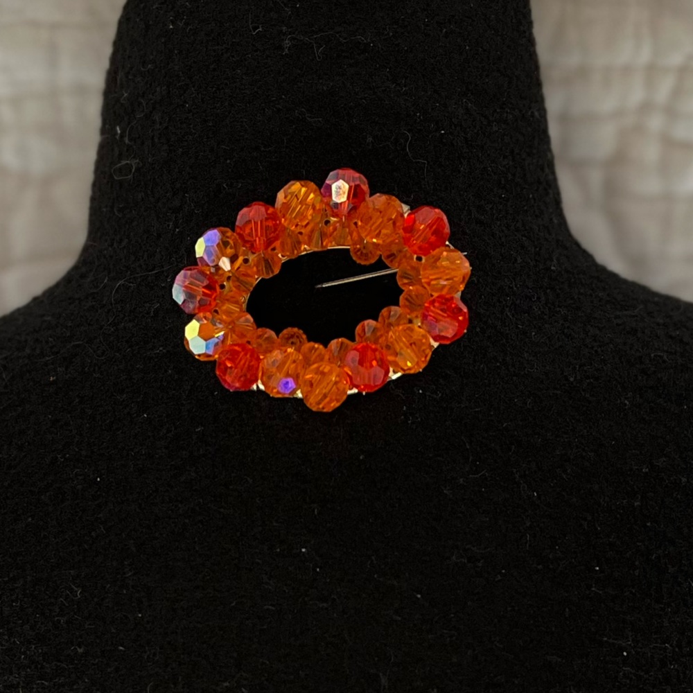 Beautiful orange hued Brooch